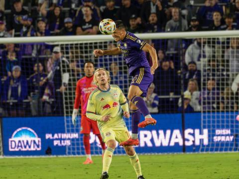 Cesar Araujo wins a header in a tough match in which Orlando City loses in the Eastern Conference Finals. PHOTO/MARIO CASAMALHUAPA