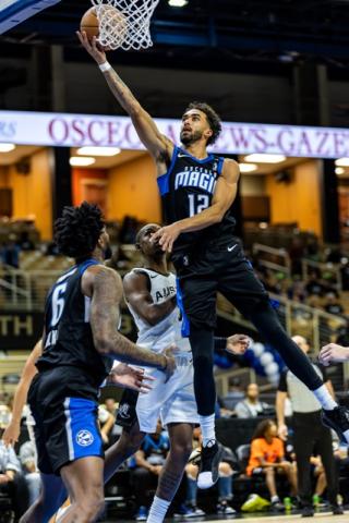With some of the Orlando Magic's starters out with injuries, Trevelin Queen, a key piece for the NBA G League's Osceola Magic, has kept the NBA aside afloat. PHOTO/TAYLOR MCFEE