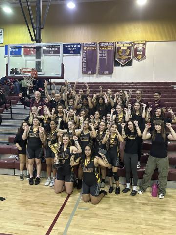 Champs Again! With 37 of 40 lifters scoring points, St. Cloud rolled to its 15th consecutive Orange Belt Conference Girls weightlifting championship, edging rival Harmony, 159-122. PHOTO/ST. CLOUD HIGH
