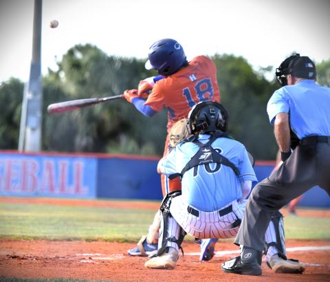 Harmony's Sam Castillo turns on a pitch in Thursday's regional semifinal-clinching 13-3 win over Lake Nona at the Mike Fields Baseball Complex. (Photo/Katie Williams)