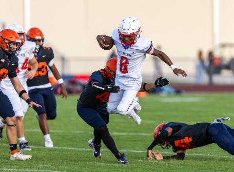 Tohopekaliga and Poinciana went at it last week at their un-scored, controlled-scrimmage spring game on the Tigers' new football field. (Photo/Taylor McFee)