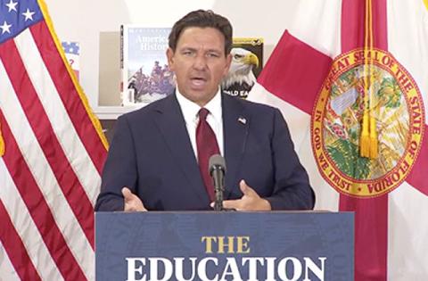 Gov. Ron DeSantis, and state and county legal and education leaders were in Sunbridge Tuesday to announce legal action against textbook publishers they say overcharged the School District of Osceola County. (Photos/https://www. clickorlando.com/news/politics/2025/08/19/florida-gov-ron-desantis-holdsnews- conference-at-st-cloud-school/)