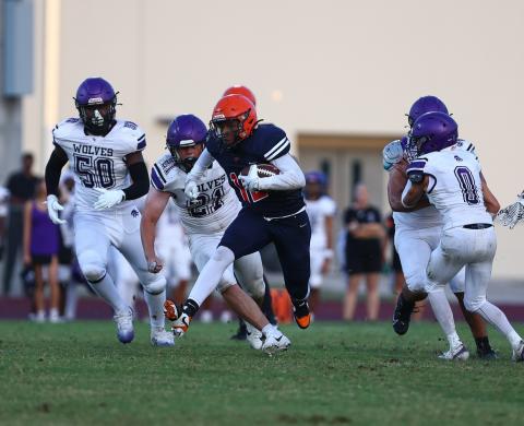 Xaevez Brown, shown here in Tohopekaliga's Kickoff Classic game against Timber Creek, had 197 total yards of offense and three touchdowns in a big District 7A-10 win Thursday over Harmony, 28-16. (Photo/Taylor McFee)