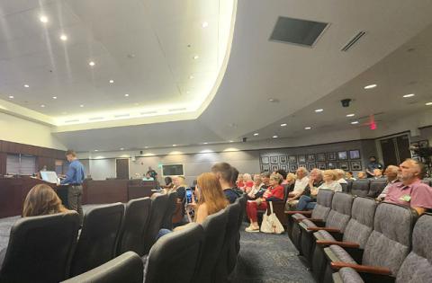 Those opposed to an illuminated Pulse shooting tribute planned for Brownie Wise Park attended Monday’s Osceola County Commission public comment meeting to lodge their dissent. (Photo/Ken Jackson)