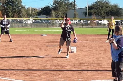 City staff, like Mayor Chris Robertson (pitching) played a game against the St. Coud Little League Challenger program Saturday. The city negotiated a new fee structure with the League that “raises the rent” but waives fees for the special-needs teams. (Photo/City of St. Cloud)