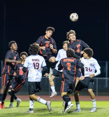 Winning the ball in the air, like this play in December's Orange Belt Conference tournament, has been key for defenders and midfielders like David Sabogal (2), Jesus Linares (3),  Augusto Bustamonte (6), Luisangel Moreno (10) and Keandre Octave (22). (Photo/Taylor McFee)