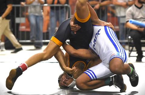Harmony’s Nathan Barrett used the mat, his body and anything else within arm’s reach, but fell 5-1 to South Dade’s Armad Williams in the 150-pound final