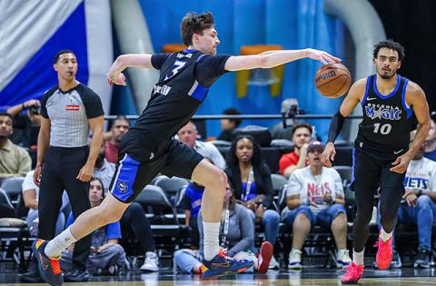Colin Castleton, who led Osceola with 25 points and 11 rebounds, tracks down a loose ball in the Magic's 119-117 G League elimination playoff game win Wednesday over the Long Island Nets at the Silver Spurs Arena. (Photo/Taylor McFee)