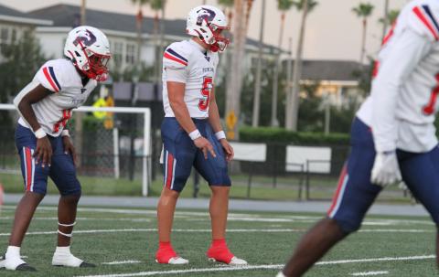 Poinciana quarterback Lucas Minenok (5) came from Ohio to leave medical and program problems behind to help the Eagles to a 3-1 record this season. (Photo/Michelle Kostuch)
