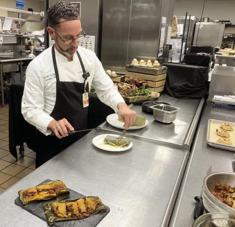 Orlando Health St. Cloud Executive Chef Roberto Santiago demonstrates how to make pasteles, a popular dish in the Hispanic community during the Christmas holidays. PHOTO/TERRY LLOYD