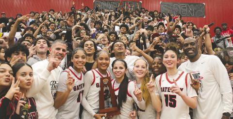 Gateway’s girls basketball team celebrated winning the Region 2 championship and a return trip to the Final 4 with their fans after Friday’s 61-51 win over New Smyrna Beach. (Photo/Ken Jackson)
