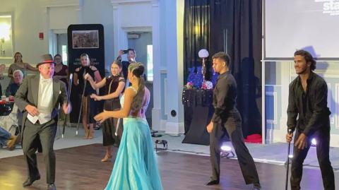 Kissimmee Police Chief Jeff O’Dell showed off his classy dance moves during Dancing with the Adanse Stars 3 Heroes and She-roes Sunday in downtown Kissimmee. PHOTO/CHRIS MILLER