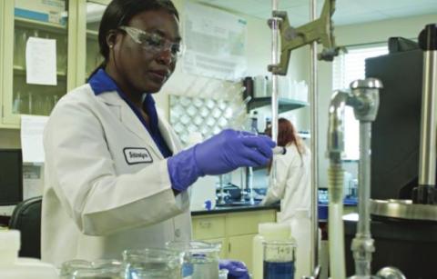 Toho Laboratory, Chemist I, Schineidyne Joseph conducting analytical testing.