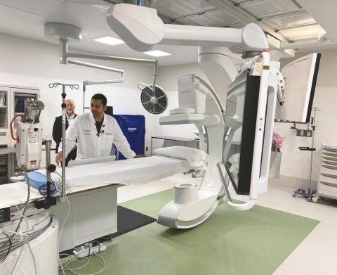 Orlando Health interventional cardiologist Dr. Prakrut Patel demonstrates the advanced technology used in the new cardiac catheterization lab opening at St. Cloud Hospital (Photo/Terry Lloyd)