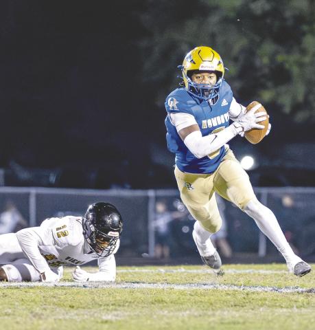 Osceola safety Jeff Banks turns upfield after intercepting a pass, leaving Viera’s Nnamdi Osuorah (12) in his wake, in Friday’s 58-14 Class 6A playoff victory. The Kowboys host Durant Friday. PHOTO/TAYLOR MCFEE