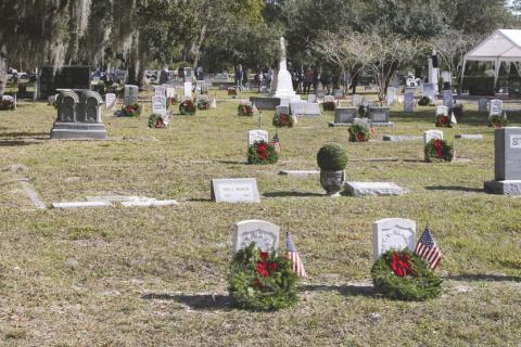 Volunteers hope to lay nearly 1,500 wreaths at the headstones of buried veterans at Mount Peace Cemetery, and a few hundred more at Rose Hill Cemetery, for Wreaths Across America on Dec. 13 to honor their service. (File Photo)
