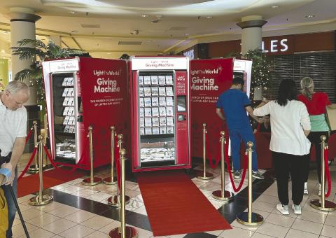 The Church of Jesus Christ of Latter-day Saints-sponsored Giving Machine to help local charities will again appear this holiday season. While at Altamonte Mall, local leaders are hoping to host one in Osceola County soon. (Submitted photos)