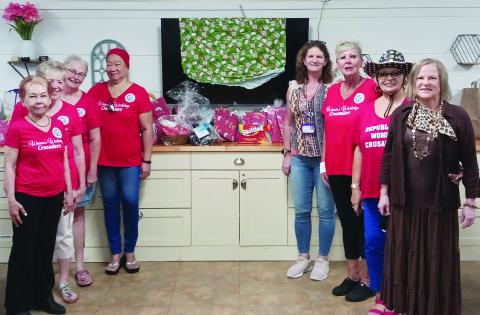 The Republican Women Crusaders offered up “Christmas in July” to families at a local shelter.