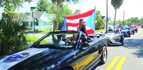 Desfile Puertorriqueno de la Florida, “The Florida Puerto Rican Parade” returned Saturday to the streets of the City of Kissimmee. PHOTO/CHRIS MILLER