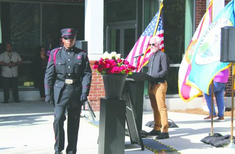 Co-workers, family members and Kissimmee’s responder honor guard members placed roses in the memory of employees who have passed at the city’s annual Employee Memorial Service Friday at the City Hall rain garden. (Photos/Ken Jackson)
