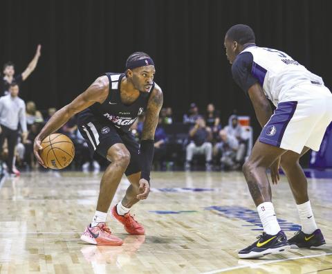 Javonte Smart (1) and Alex Morales were away from the Osceola Magic for two games while playing for their home countries in the Federal International Basketball Association (FIBA) World Cup qualifying tournament. (Photos/Taylor McFee)