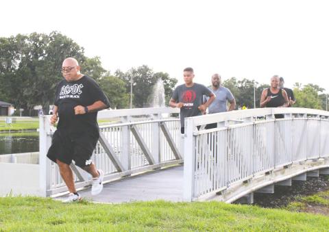 Team BLUFOR members completed a multi-event Red, White, & Blue Trifecta Mission Saturday at the St. Cloud Lakefront. (Photo/Terry Lloyd)
