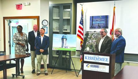 U.S. Rep. Darren Soto, center left, and State Representative José Alvarez, center right, announced Friday over $21 million in federal and state grants for aviation infrastructure projects at Kissimmee Gateway Airport. Photo includes, from left, Deputy City Manager Desiree Matthews, City Manager Mike Steigerwald and Director of Aviation Shaun Germolus. (Photo/Terry Lloyd)