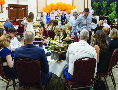 All of the big Orange Belt Conference trophy ended up on the same table Thursday -- St. Cloud High's table. (Photo/Taylor McFee)